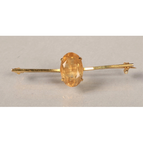 125 - 9ct gold citrine set bar brooch 