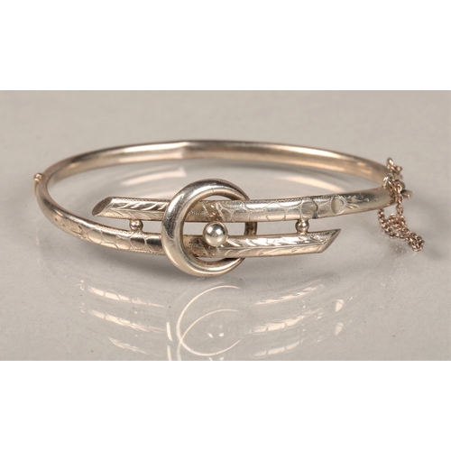 136 - Silver bangle and white metal buckle design bangle