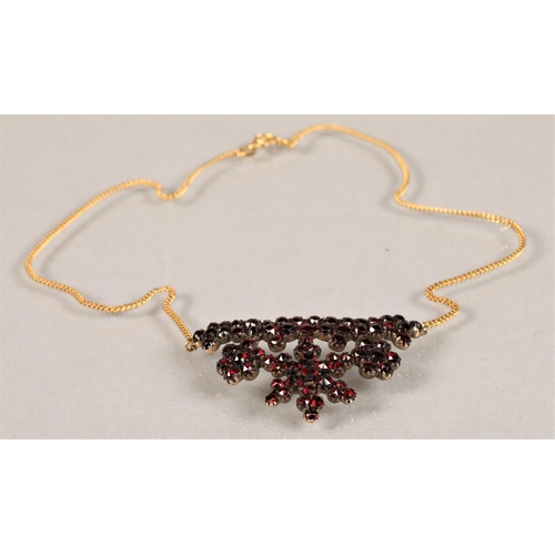 137 - 8ct gold chain with white metal Garnet set pendant