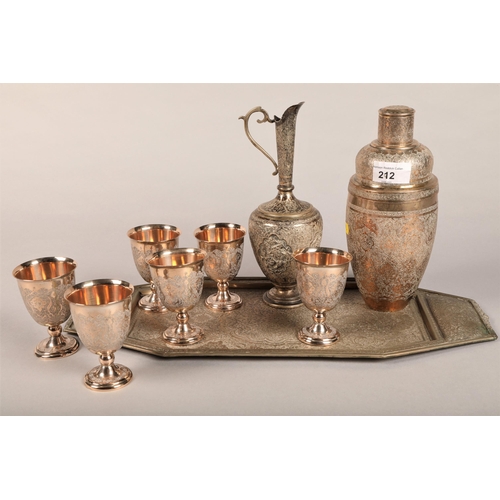 212 - Eastern white metal cocktail shaker, tray, cups etc