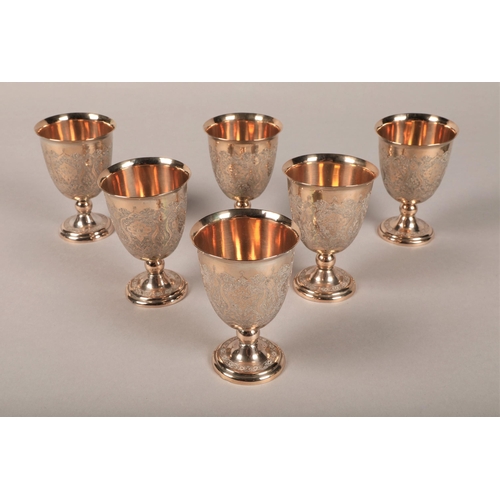 212 - Eastern white metal cocktail shaker, tray, cups etc