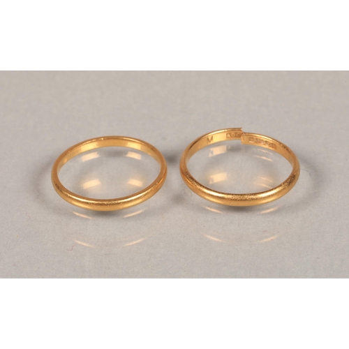 56 - Two 22ct gold bands, one size K/L, one cut, total weight 3.8g