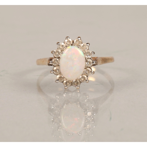 64 - 9ct gold opal and white gem set ring, size R