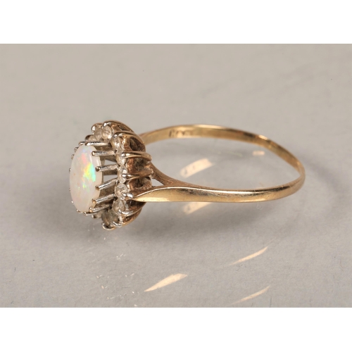 64 - 9ct gold opal and white gem set ring, size R