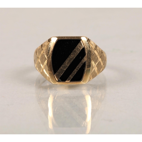 67 - 9ct gold and black stone set signet ring, size Q/R, total weight 4.7g