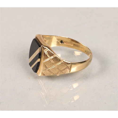 67 - 9ct gold and black stone set signet ring, size Q/R, total weight 4.7g