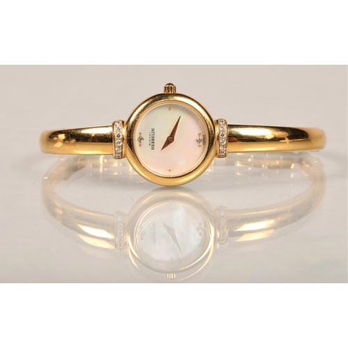 80 - Michel Herbelin, Paris, ladies gold toned gem set wrist watch with mother of pearl face