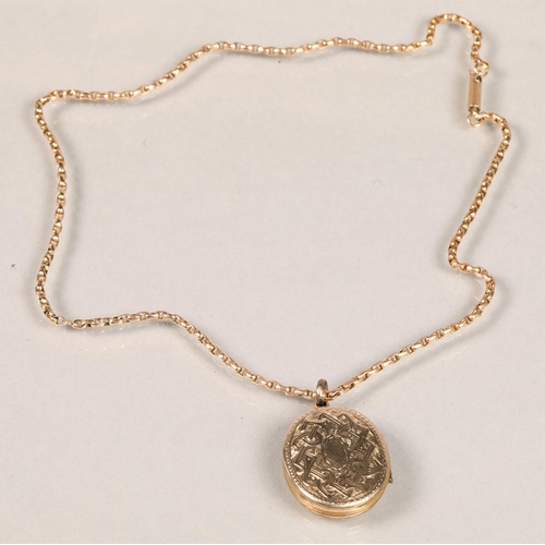 88 - 9 ct gold chain 6 grams with oval yellow metal locket,