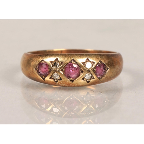 92 - 9 ct yellow gold ring with red stones and diamond chips, size R