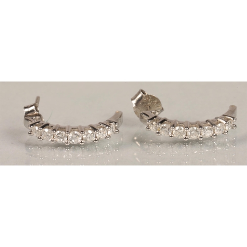 96 - Pair of white metal and diamond earrings