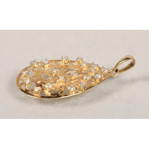 97 - 10 K yellow gold pendent with diamond chips, 2.5 cm long