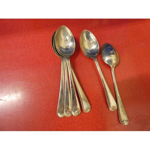 440 - Set of six Dignity silver tea spoons.