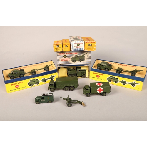 Seven boxed Dinky toys to include military ambulance no. 626 recovery tractor 661 field gun 697 x2