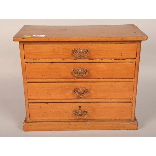 492 - Four drawer table top dresser, 35cm h