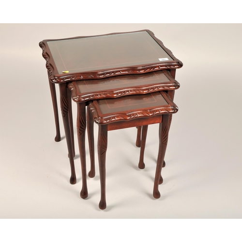 503 - Set of three mahogany glass topped nesting tables