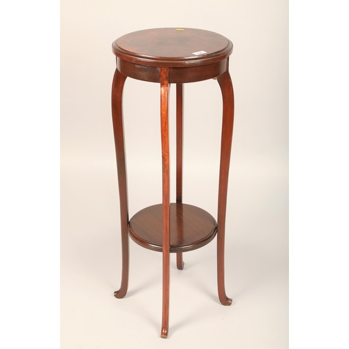 538 - Walnut topped mahogany plant stand, 95cm high 36cm diameter, with lower shelf 