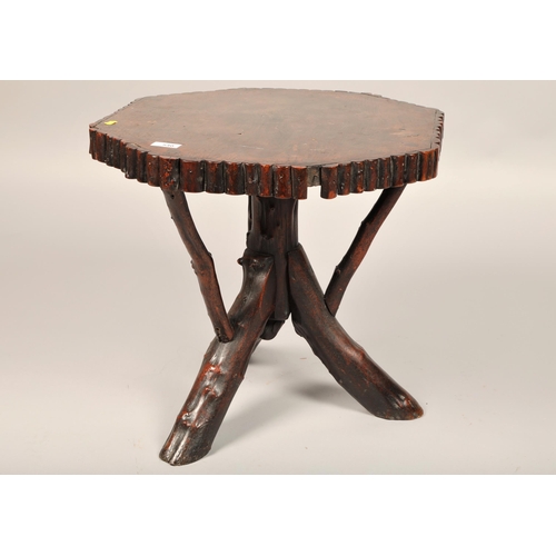 540 - Octagonal oak occasional table 48cm high 50cm diameter