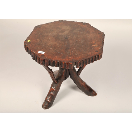 540 - Octagonal oak occasional table 48cm high 50cm diameter