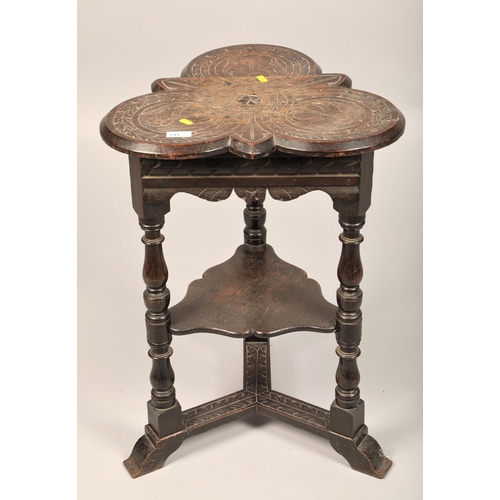 541 - Carved floral design oak occasional table 67cm h