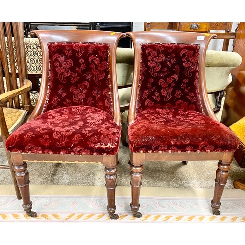 576 - Pair of Victorian dining chairs on casters