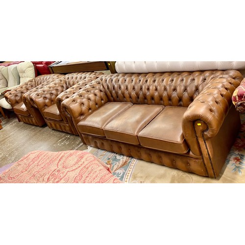 572 - Chesterfield three seater settee and two arm chairs