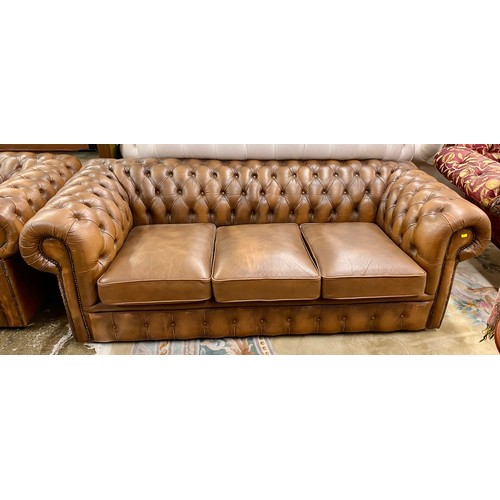 572 - Chesterfield three seater settee and two arm chairs