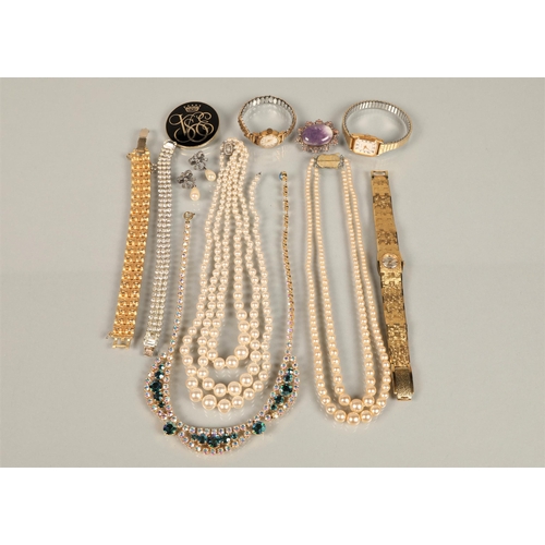 115 - Assortment of costume jewellery including pearls, wrist watches, brooches, etc.