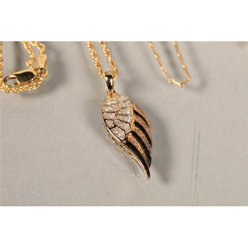 121 - Three 9ct gold chains, total weight 7.1g, and one sterling silver with gem set angel wing pendant (4... 