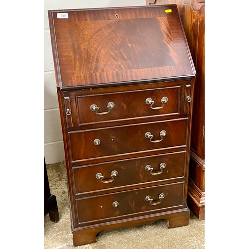 560 - Mahogany writing bureau over four drawers, 95cm h