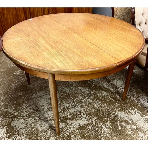 563 - Teak extending dining table, 122cm d