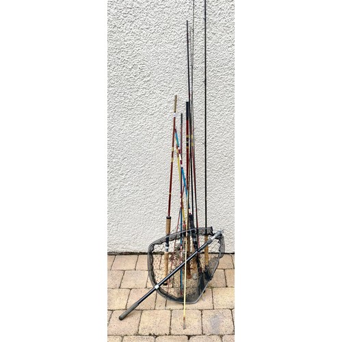 493 - Fishing net and assorted rods