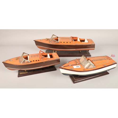 506 - Three scale model speed boats on stands, largest 50cm long (3)