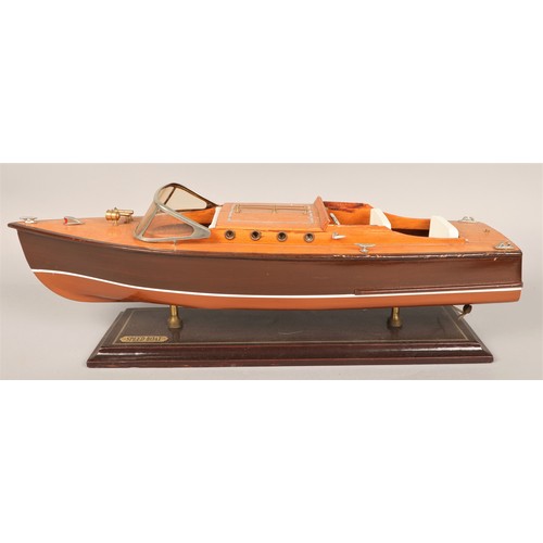 506 - Three scale model speed boats on stands, largest 50cm long (3)