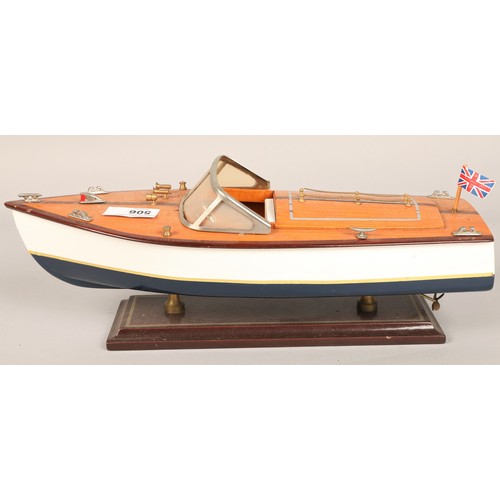 506 - Three scale model speed boats on stands, largest 50cm long (3)