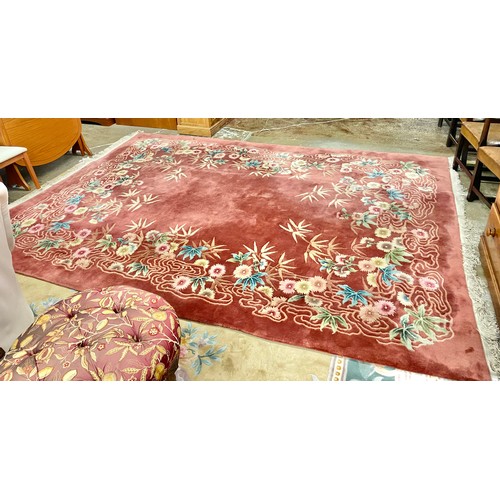 578 - Chinese woolen rug on red ground