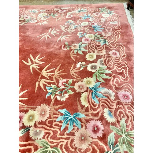 578 - Chinese woolen rug on red ground