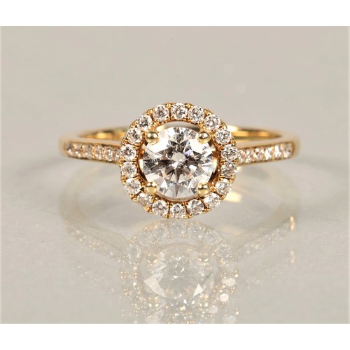 100A - Diamond solitaire cluster ring , the central stone 0.72 carats on yellow metal,  with E G L certific... 