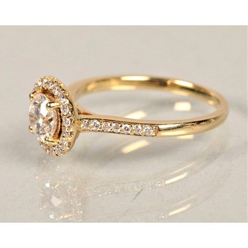 100A - Diamond solitaire cluster ring , the central stone 0.72 carats on yellow metal,  with E G L certific... 