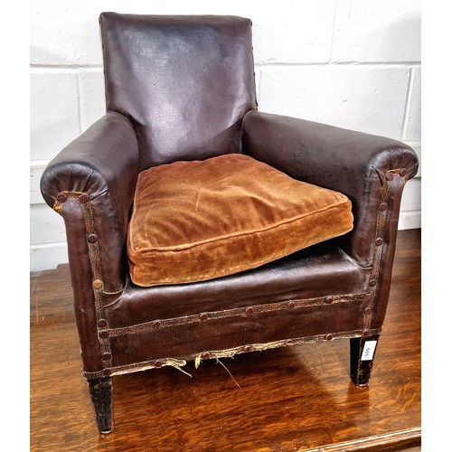 605 - Antique leather upholstered childrens arm chair