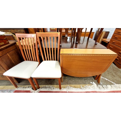 595 - Contemporary set of two dining chairs and drop leaf dining table