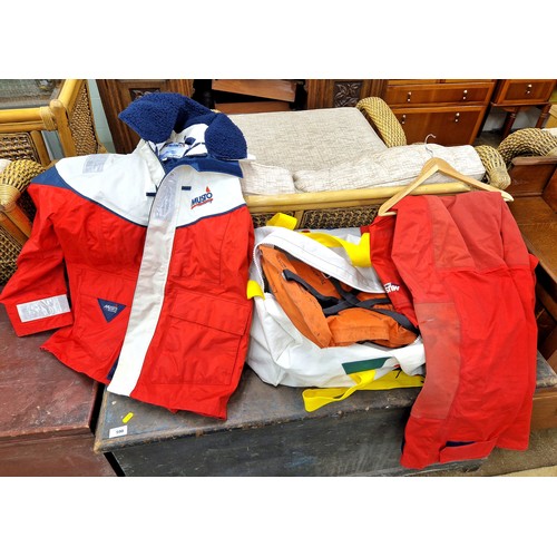 591 - Musto sailing jacket and trousers both size M, life jacket, wellies size 45, and holdall bag