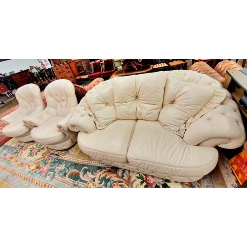 583 - Three piece white leather suite( two arm chairs one two seater settee)