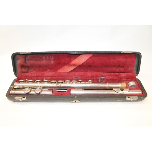 64 - V.Kohlert and Winnenden three piece flute in fitted case.