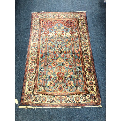 841 - Persian rug depicting garden setting with urn and flowers flanked by columns, 203 x 130cm