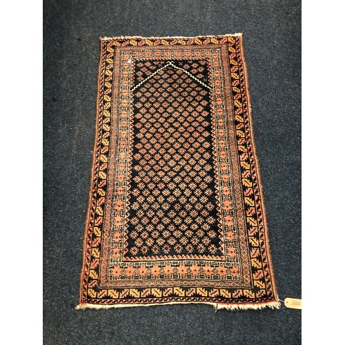 847 - Turkoman rug with mihrab and flower head motif, 156 x 90cm.