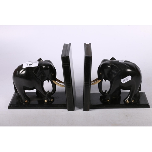 100 - Pair of ebony elephant bookends, 15cm.