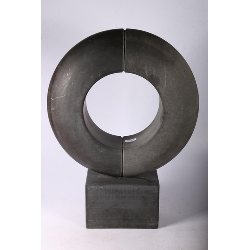 109 - Sculptural stone ring on plinth, 40cm.