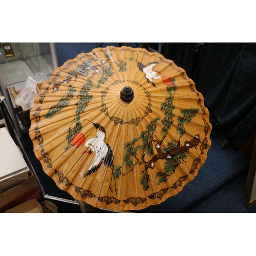 112 - Two Japanese umbrellas, one painted, 60cm.