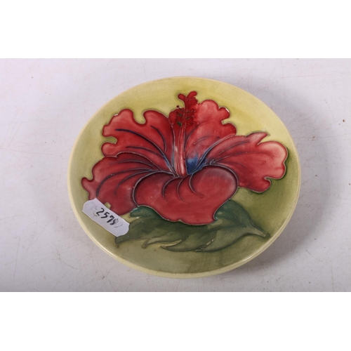 66 - Moorcroft hibiscus plate, 12cm.