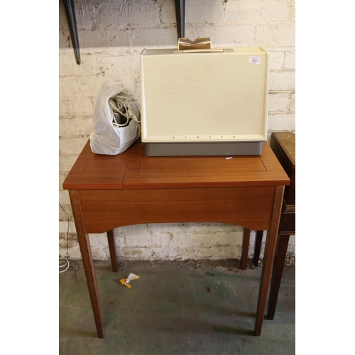 767 - Teak sewing table (no machine), 77cm, and a cased singer sewing machine.